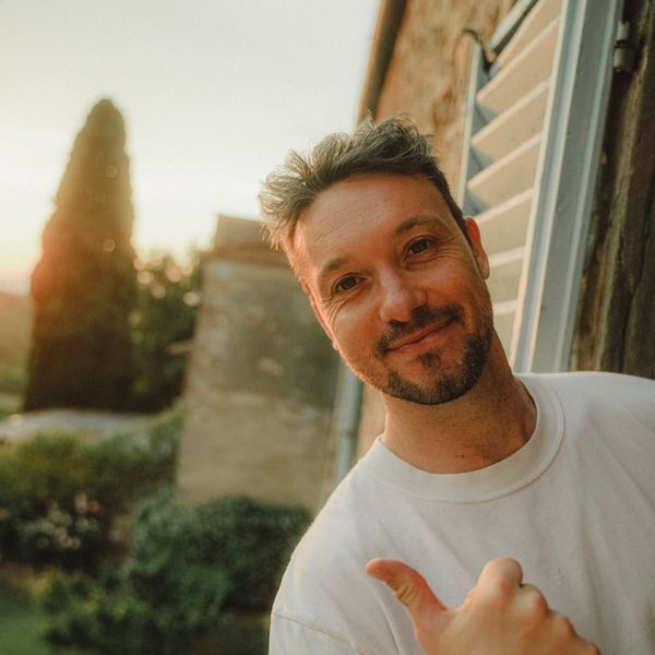 Tom Scharre giving a thumbs up